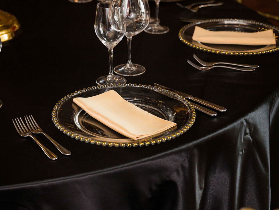 Nero Verona table linen, Gold Beaded charger plate paired with Golden Verona napkin