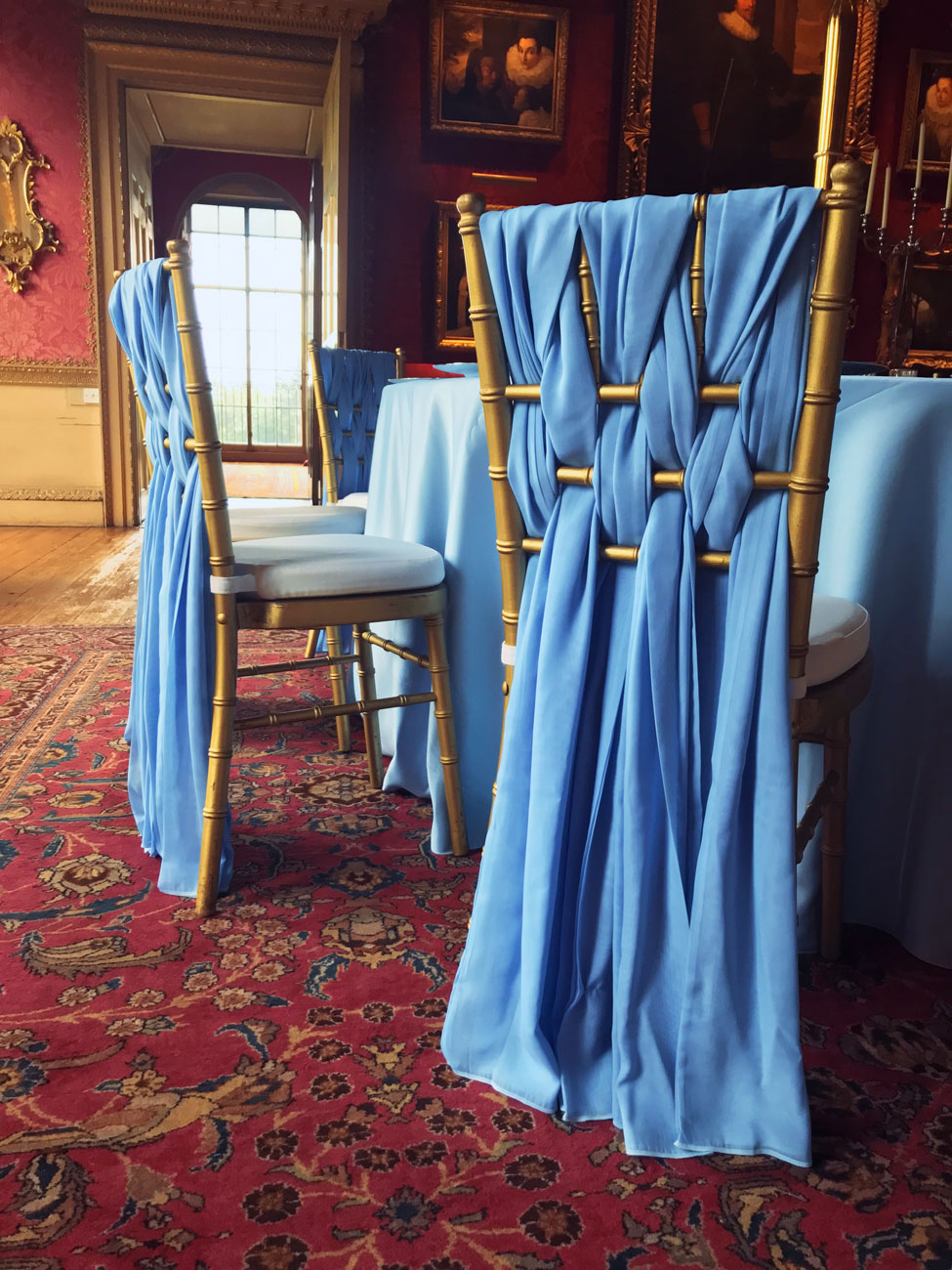 Powder Blue Verona table linen, Gold Chiavari Chairs with White Essential seat pads and Powder Blue Santina Weaves at Hopetoun House