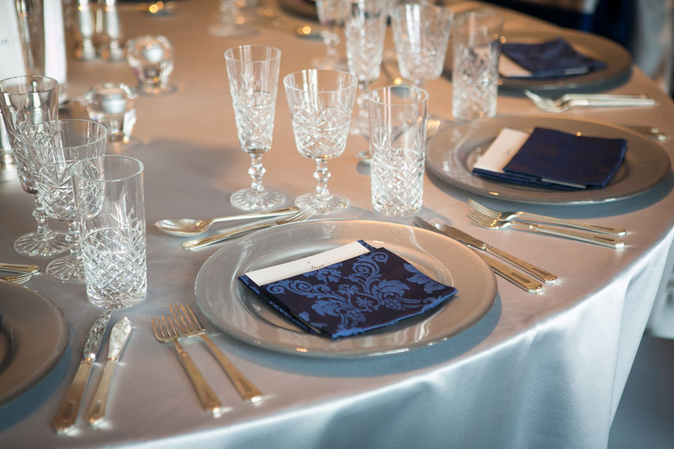 French Navy Vintage Damask napkins paired with Silver Milano table linen and Cut Crystal glasses at Trump Turnberry Resort