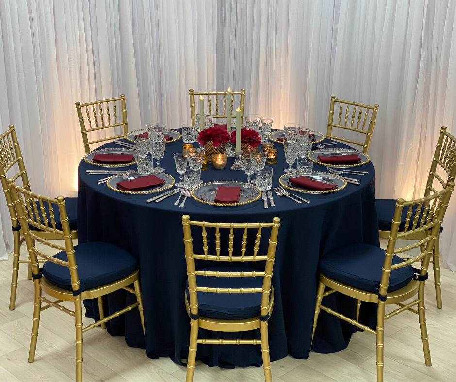 Navy Essential tablecloth with Gold Chiavaris w/matching Navy Essential cushioned pads