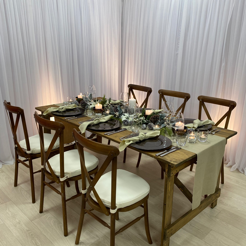 Styling features: Crossback chairs w/cream Essential pads, caramello Gelato runner & napkins, brown chargers & Copper detail tumblers & Riedel glasses.